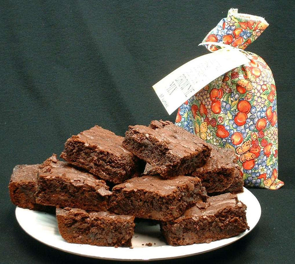 Image of plate of Nans Nummies Chocolate Chip Brownies and bag of mix