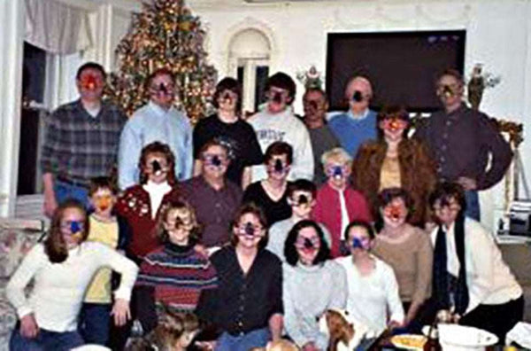 Kerry G.'s family wearing grandma's hand made nose warmers